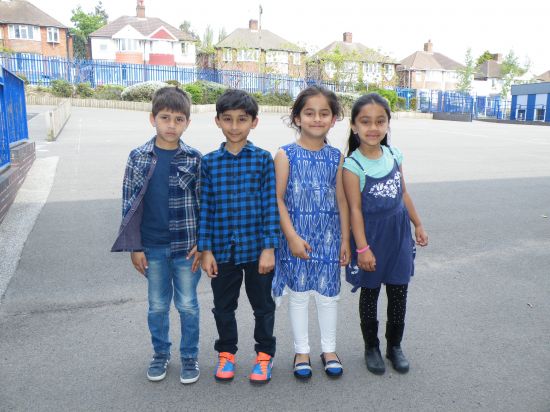 Year 1 children wearing blue in aid for Unicef day for change